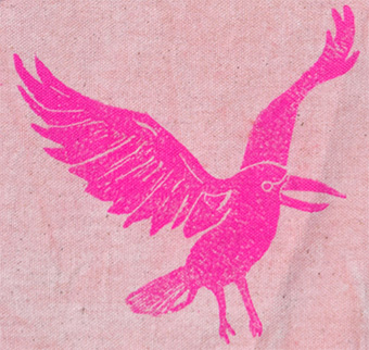 A purple crow on pink fabric